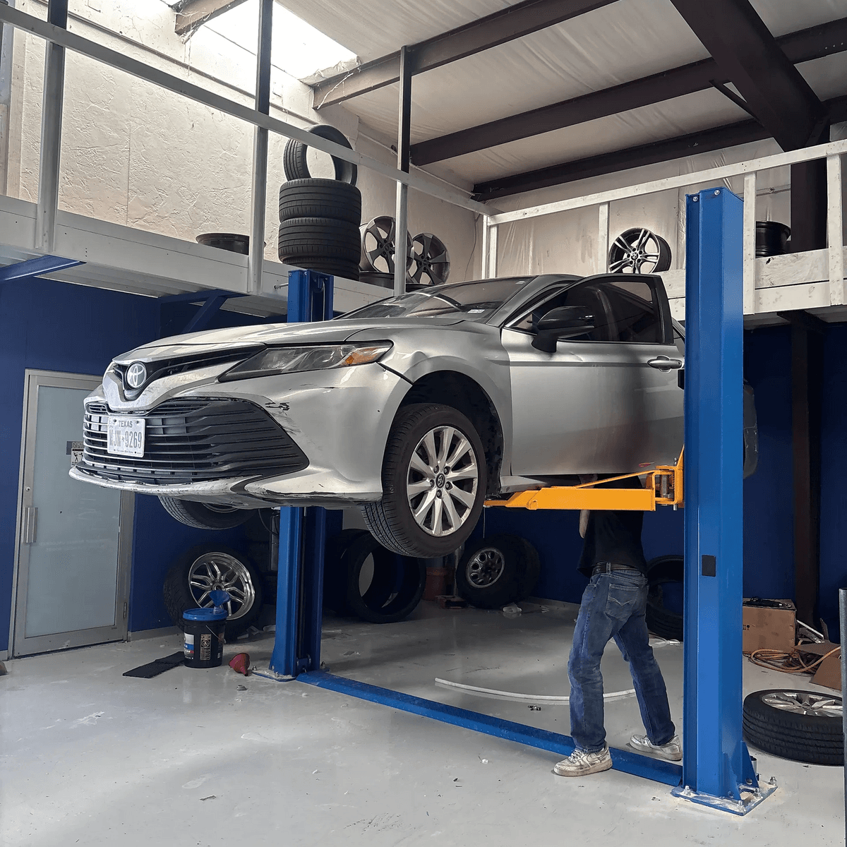Laser tire alignment machine in operation